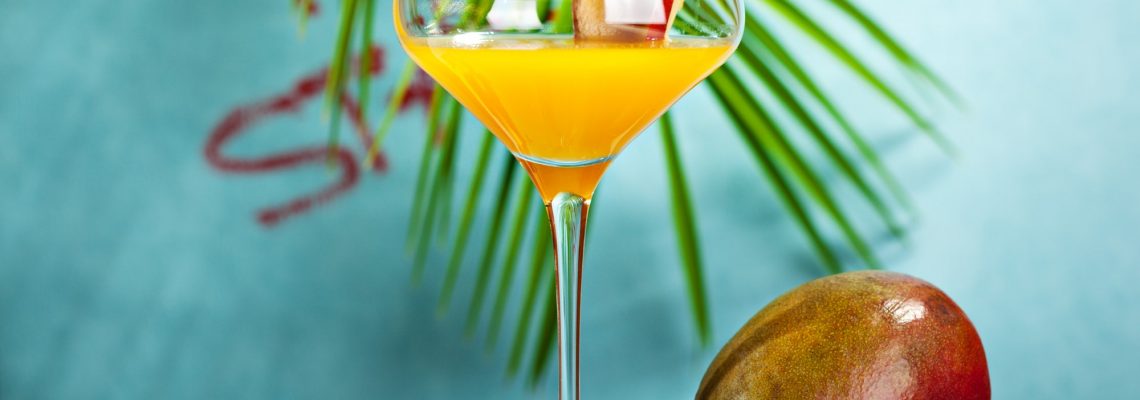 Drink mixology to create a Pornstar Martini