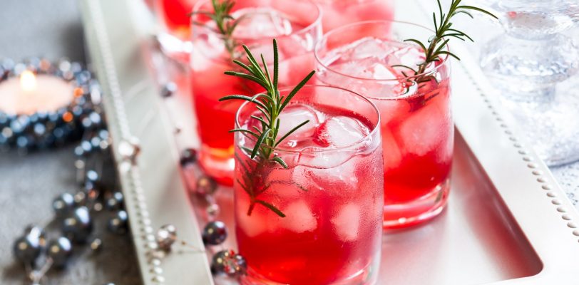 Festive holiday cocktails on a serving tray